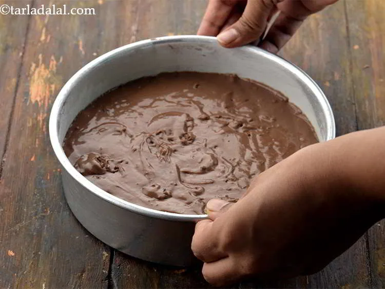 Step 50 – Once again tap it to remove the air in the batter. Keep aside.&nbsp;<br /> &nbsp;