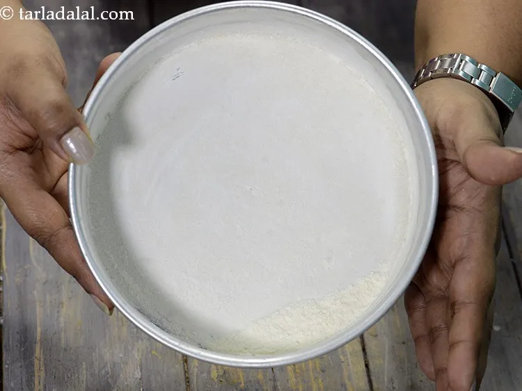 Step 5 – Dust the cake tin with plain flour as after the cake is cooked it&rsquo;s very …