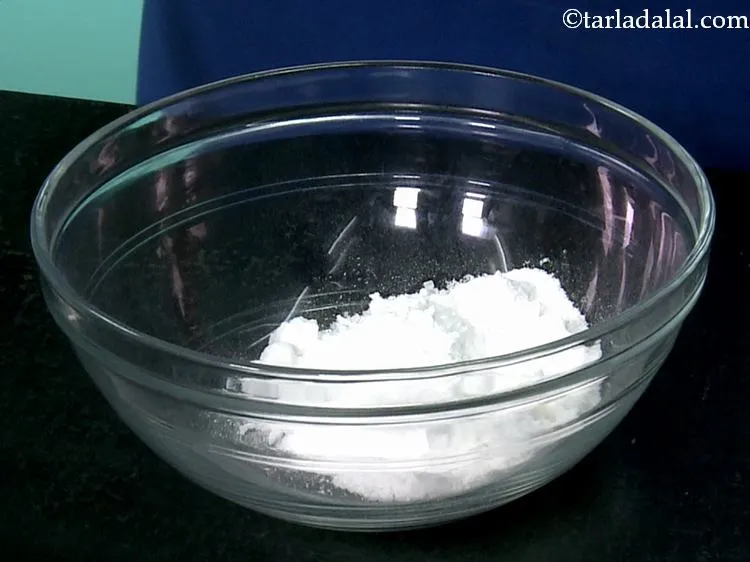 Step 5 – In another bowl take sugar.