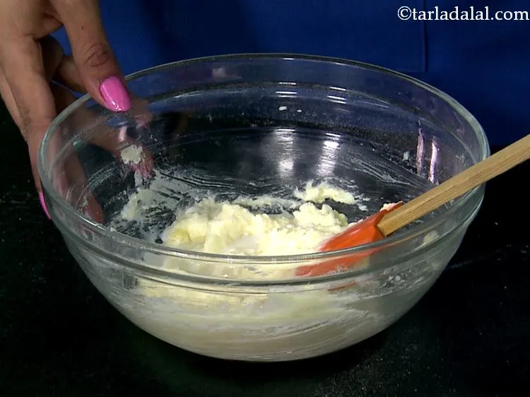 Step 8 – Creamed butter and sugar is ready.&nbsp;Now add vanilla essence and milk.