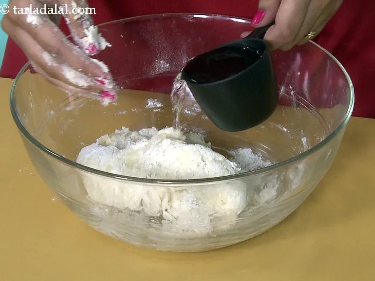 Step 17 – Knead into a soft and loose dough using water, if required. You will feel that …