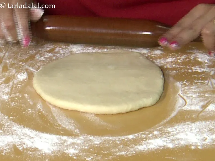 Step 22 – Roll a portion of the dough into a 150 mm. (6&rdquo;) diameter thick circle. Prefer …