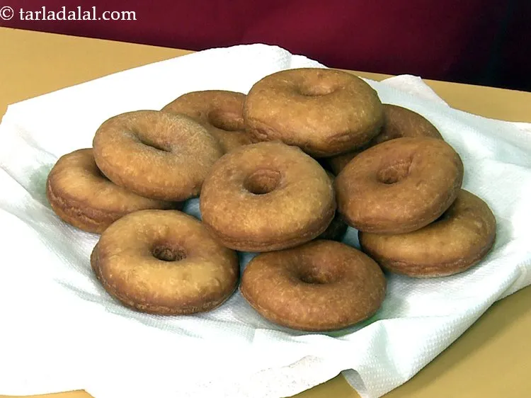 Step 32 – Drain the <strong>chocolate doughnut recipe | chocolate donuts | easy homemade chocolate doughnuts </strong>on an …