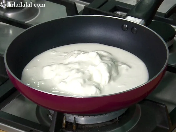 Step 33 – For the <strong>dark chocolate sauce for chocolate doughnuts</strong>, put fresh cream in a broad non-stick …