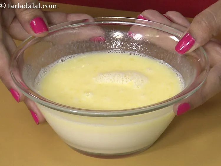 Step 10 – Mix well using a spoon. As the milk is warm, the butter will melt in …