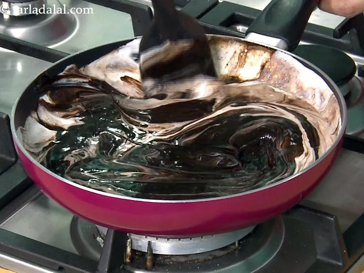 Step 37 – Mix well, till the chocolate melts.&nbsp;