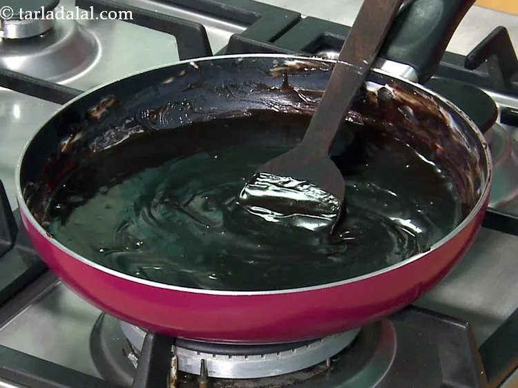 Step 38 – This is how <strong>smooth chocolate sauce / dark chocolate glaze</strong> will look like after mixing. …