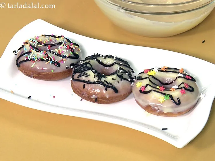 Step 52 – Serve <strong>chocolate doughnuts</strong> immediately or store refrigerated in an air-tight container and serve within 2 …