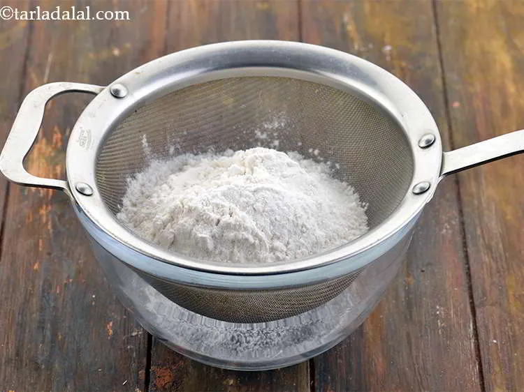 Step 21 – Put the plain flour into it.