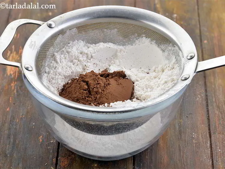 Step 8 – Now, add the cocoa powder.