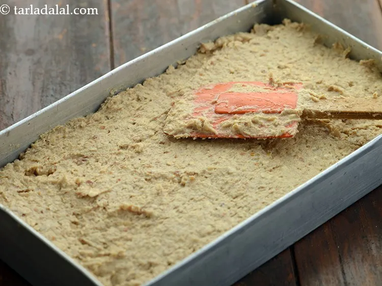 Step 24 – Transfer the mixture into a baking tray of 225 mm. X 125 mm. (9&rdquo; x …