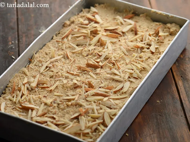 Step 25 – Sprinkle the almond slivers evenly over it.