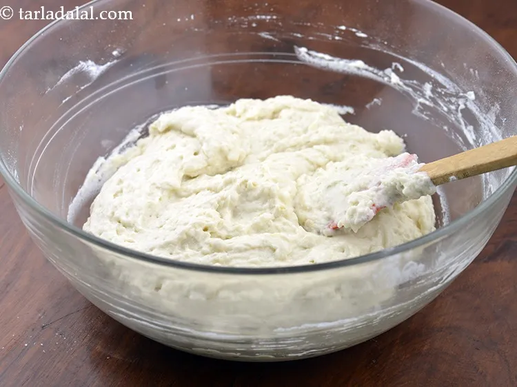 Step 13 – Add the plain flour mixture and mix well using a spatula. The batter for the …