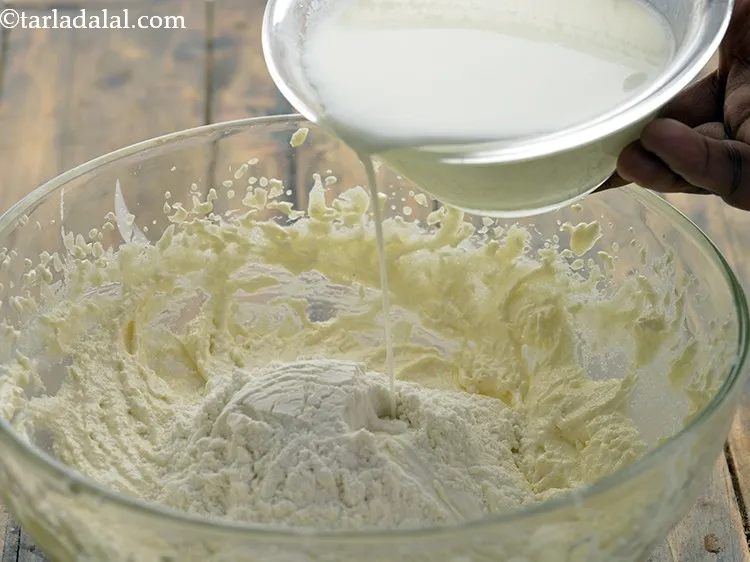 Step 14 – Add the sieved plain flour mixture and milk alternatively and beat it lightly till mixed …