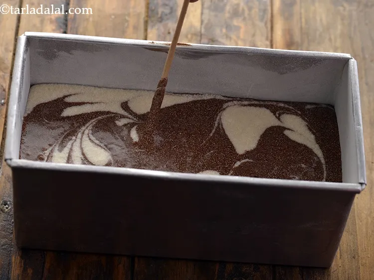 Step 20 – Take a fork or a toothpick, pass it through the batter till the bottom and …