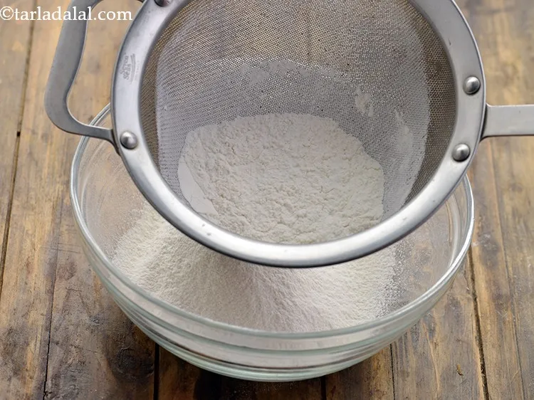 Step 9 – Sift together to get a lump-free flour and keep aside.