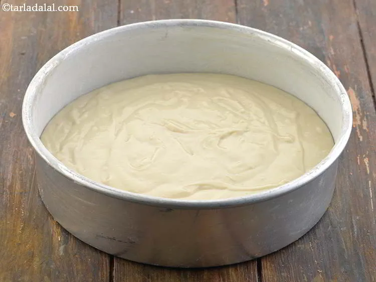 Step 18 – Tap the tin gently to spread the batter evenly.
