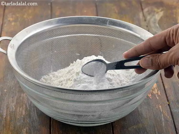 Step 8 – Now, put the baking powder into it.