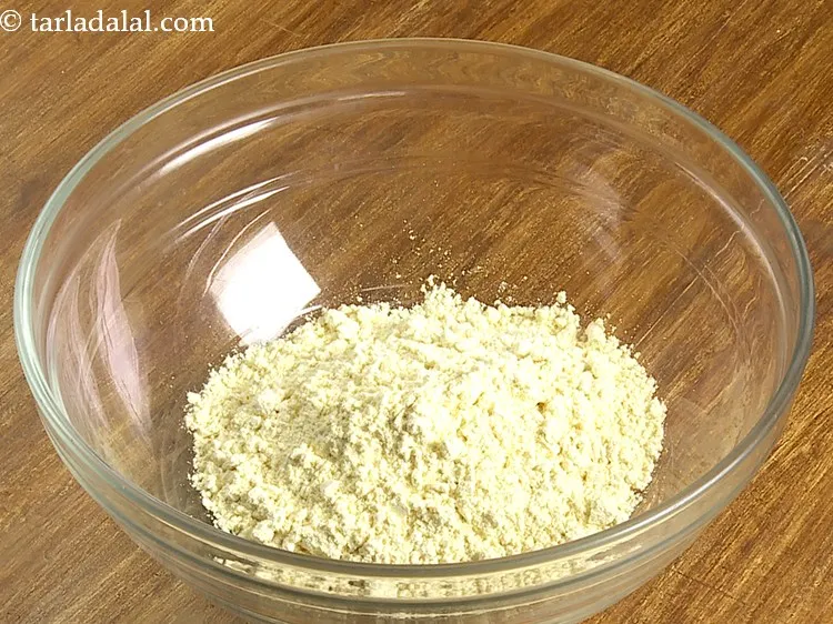 Step 2 – For making the batter of <strong>crispy eggplant pakora</strong>, in a deep bowl take besan.