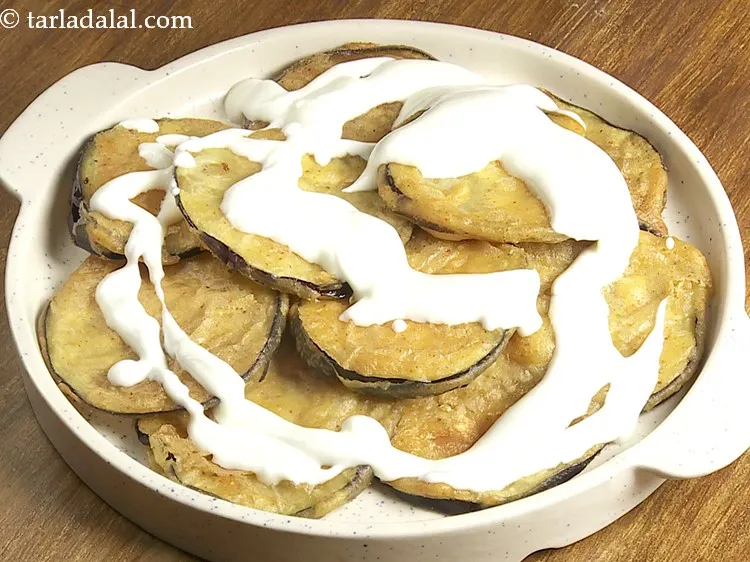 Step 20 – Pour &frac14; cup of curd. To learn <a href="https://www.tarladalal.com/How-To-Make-Curd-Or-Dahi-At-Home-2790r" target="_blank">how to make Dahi</a>, check out …