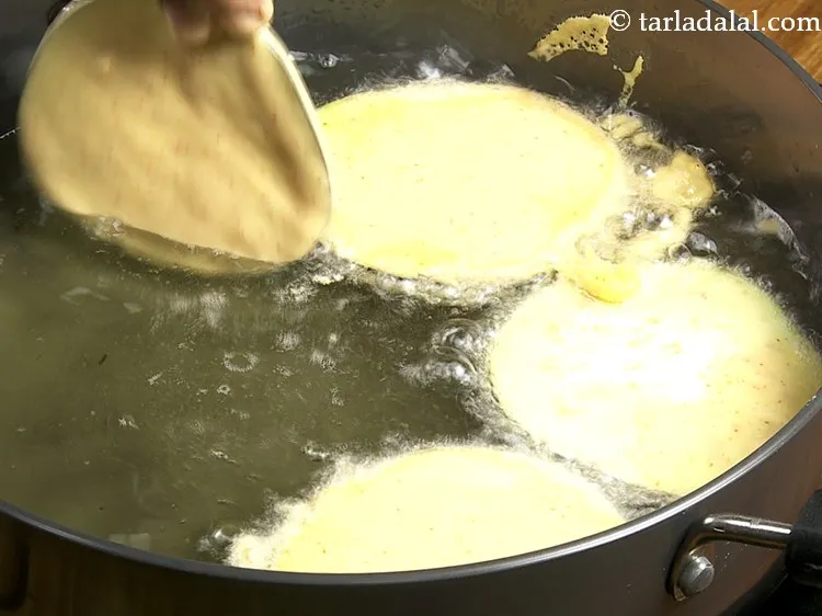 Step 10 – Drop it carefully in hot oil.