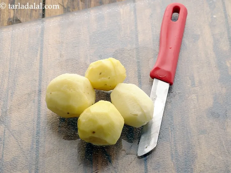 Step 10 – Make criss-cross slit on each baby potato.
