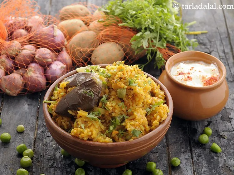 Step 40 – Enjoy the <strong>delicious ek toap na dal bhaat</strong> with a glass of <a href="https://www.tarladalal.com/Chaas-Buttermilk-Recipe-Salted-Chaas-Recipe-542r" target="_blank">buttermilk</a> …