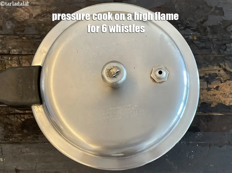 Step 13 – Pressure cook on a high flame for 6&nbsp;whistles.