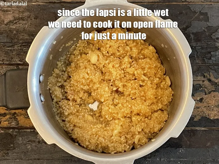 Step 17 – Since the <strong>pressure cooker lapsi | pressure cooker broken wheat dessert |</strong> is a little …