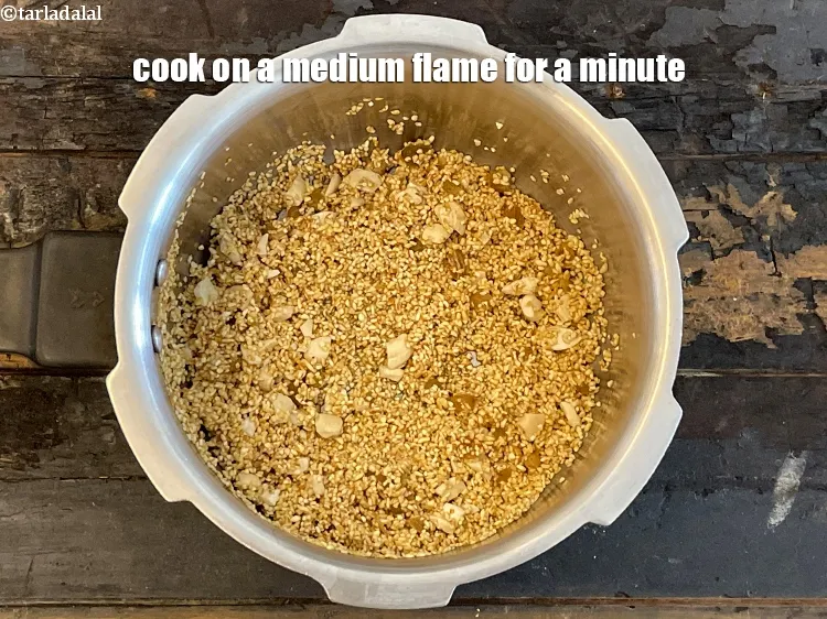 Step 9 – Cook on a medium flame for a minute.