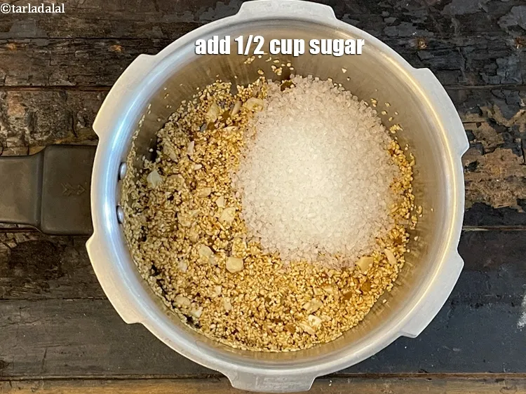 Step 10 – Add&nbsp;<meta charset="UTF-8" />1/2 cup&nbsp;<a href="glossary-sugar-chini-shakkar-278i">sugar</a>.