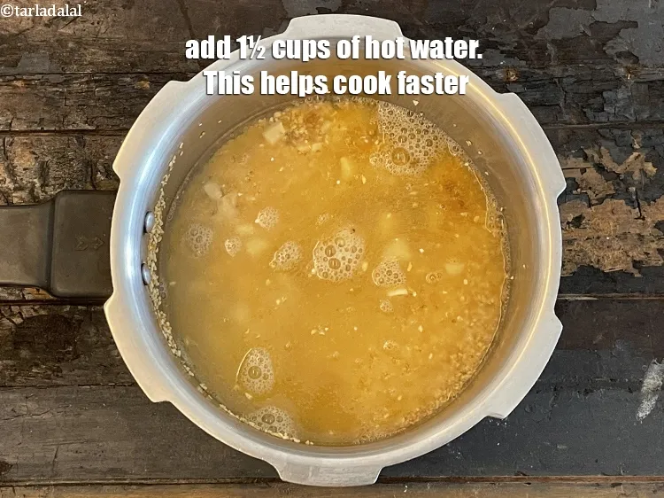 Step 11 – Add&nbsp;<meta charset="UTF-8" />1&frac12; cups of hot water. This helps cook faster.