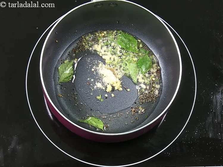 Step 14 – Add 1/4 tsp&nbsp;<a href="https://www.tarladalal.com/glossary-asafoetida-hing-113i">asafoetida (hing)</a>.