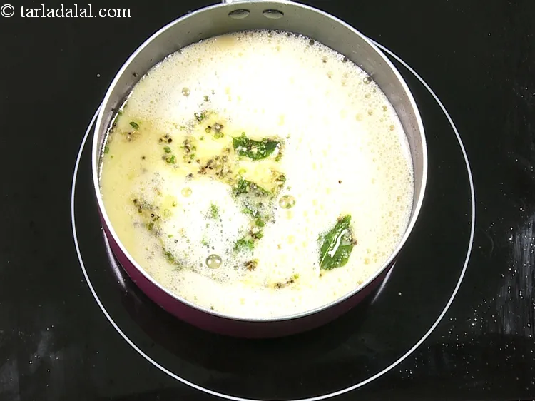 Step 16 – Add the besan-water mixture.