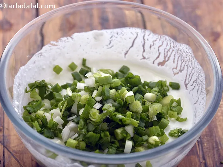 Step 25 – Add chopped spring onions.
