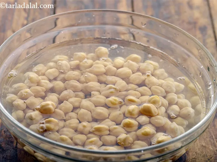 Step 5 – Submerge in enough water, cover and soak the kabuli chana overnight.