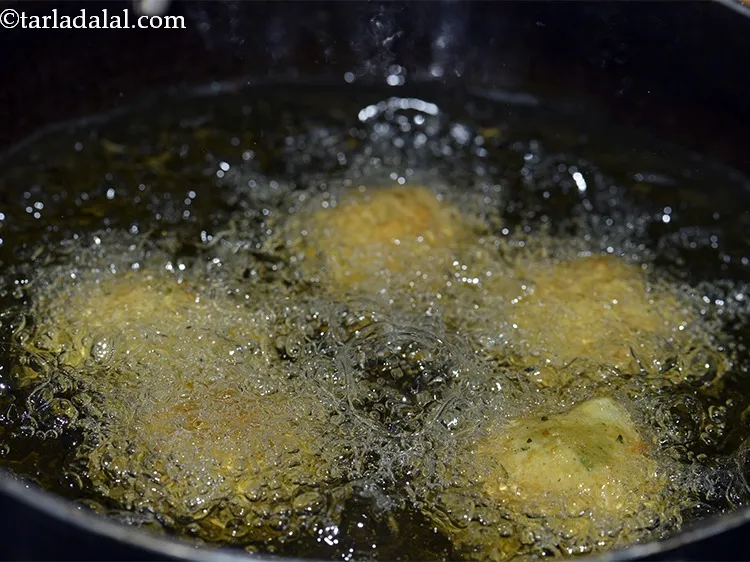 Step 19 – Shape 5 more portions into a ball and put it in the oil. You can …