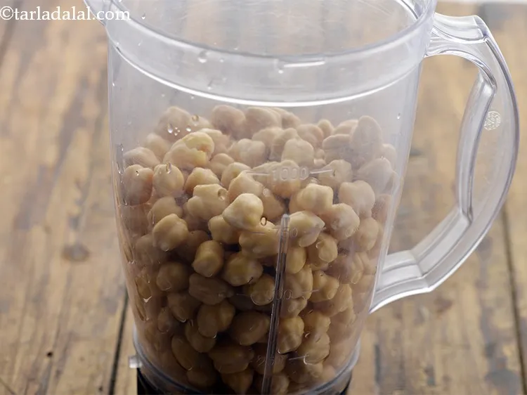 Step 6 – In the morning, drain the kabuli chana and transfer to a mixer jar. There is …