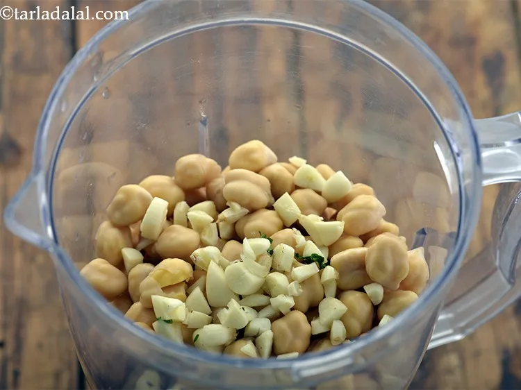 Step 7 – Add the chopped garlic.