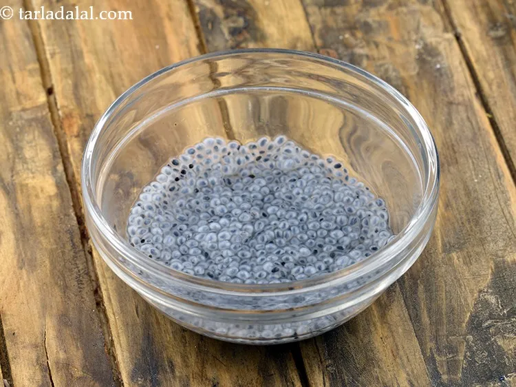 Step 24 – Top each glass with the 1 tsp of soaked <a href="https://www.tarladalal.com/glossary-falooda-seeds-sabja-seeds-basil-seeds-tukmaria-1811i">falooda seeds (subza)</a>.