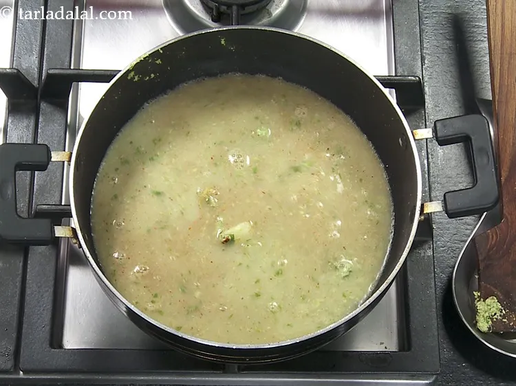 Step 36 – Add 1&frac12; cups of hot water to get the consistency of the f<strong>arali misal recipe …