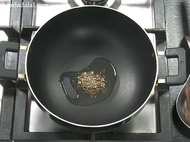 Step 28 – Add 1 tsp&nbsp;<a href="https://www.tarladalal.com/glossary-cumin-seeds-jeera-zeera-381i">cumin seeds (jeera)</a>.