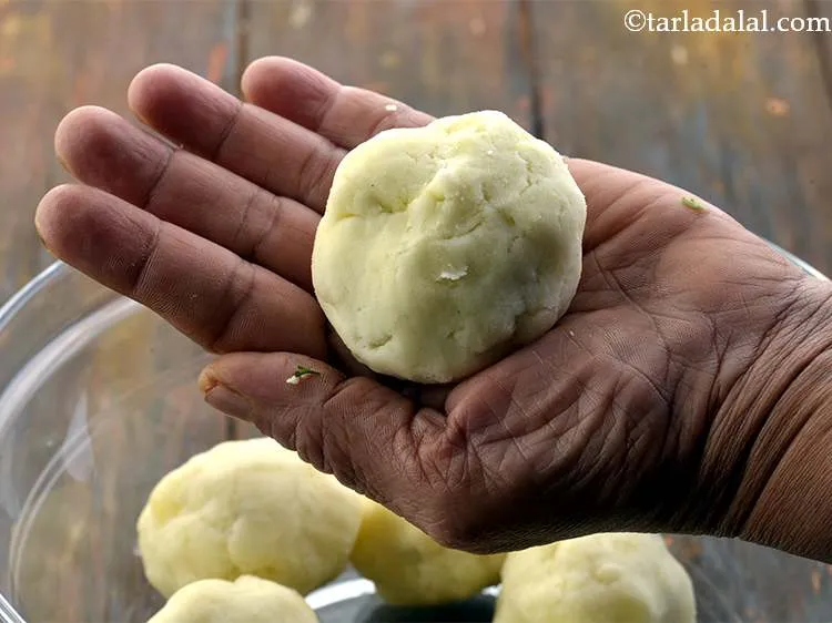 Step 24 – Seal the stuffing by bringing all edges together .