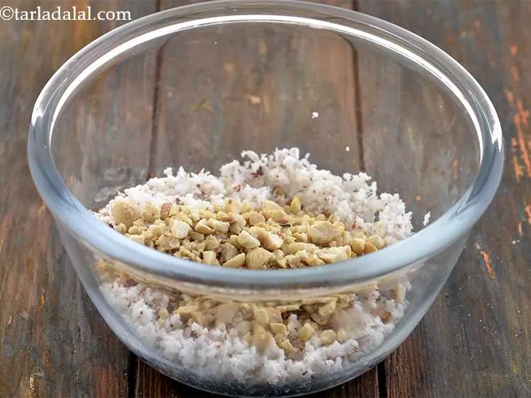 Step 3 – Add the roasted and coarsely powdered peanuts for the crunch.