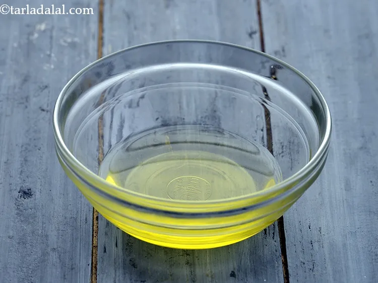 Step 8 – In a bowl or small glass bottle, take olive oil in a bowl. Most salad …