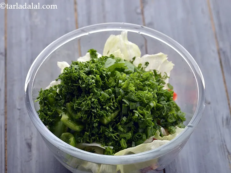 Step 21 – Add finely chopped spring onion greens.