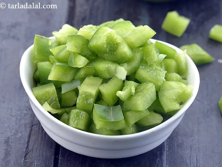 Step 33 – Finely chopped capsicum would be a flavourful addition to these fritters.&nbsp;