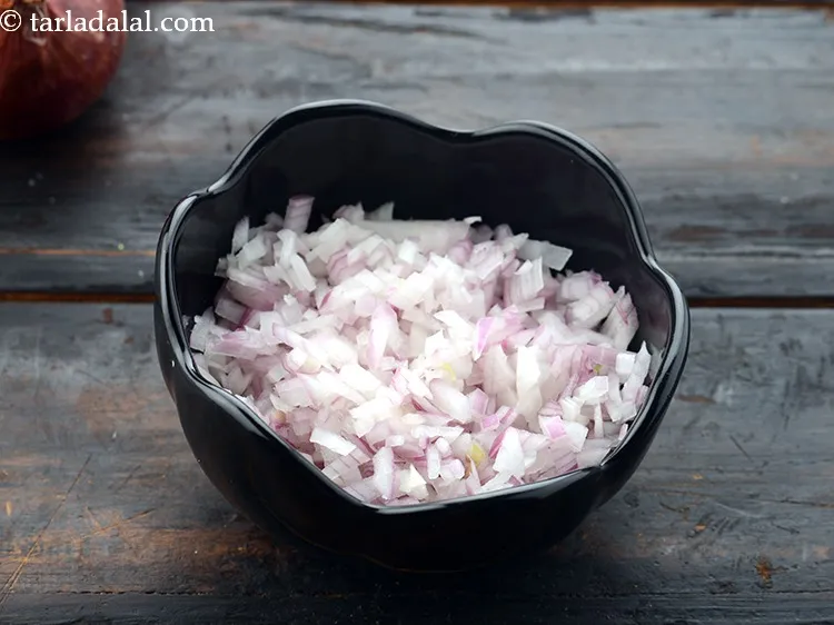 Step 31 – The onions have to be chopped finely, so it is easy to roll the paratha …