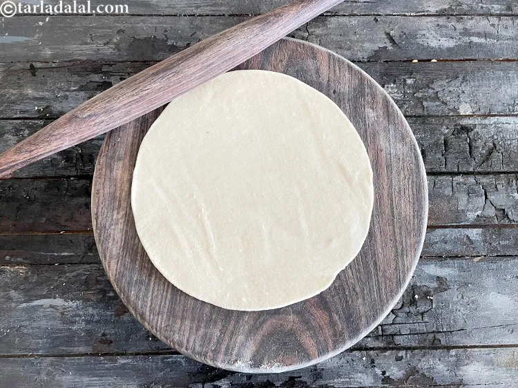 Step 22 – Roll each portion into a 200 mm. (8&rdquo;) diameter circle.