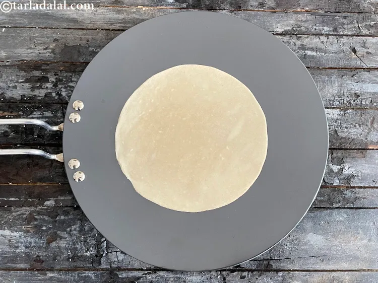 Step 23 – Heat a non-stick tava (griddle).